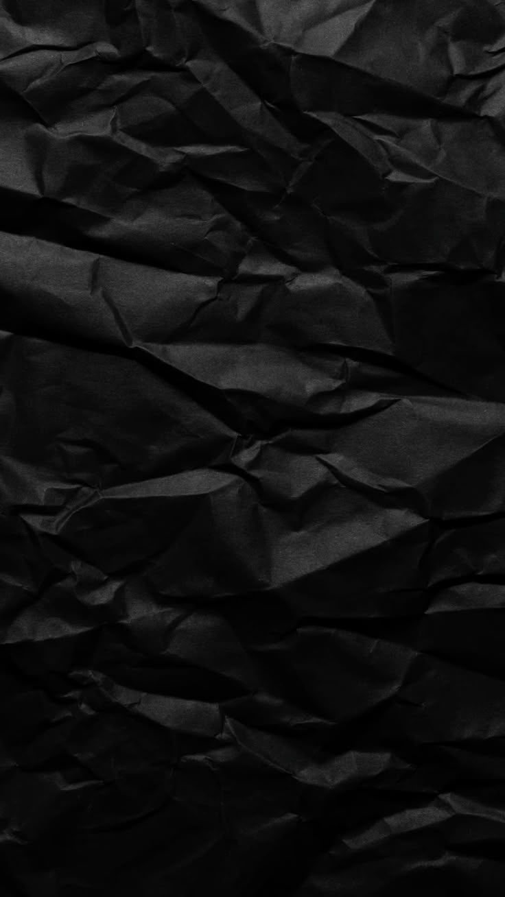 Creating Adam blog post title image. Black crumpled paper, elevating black colour.