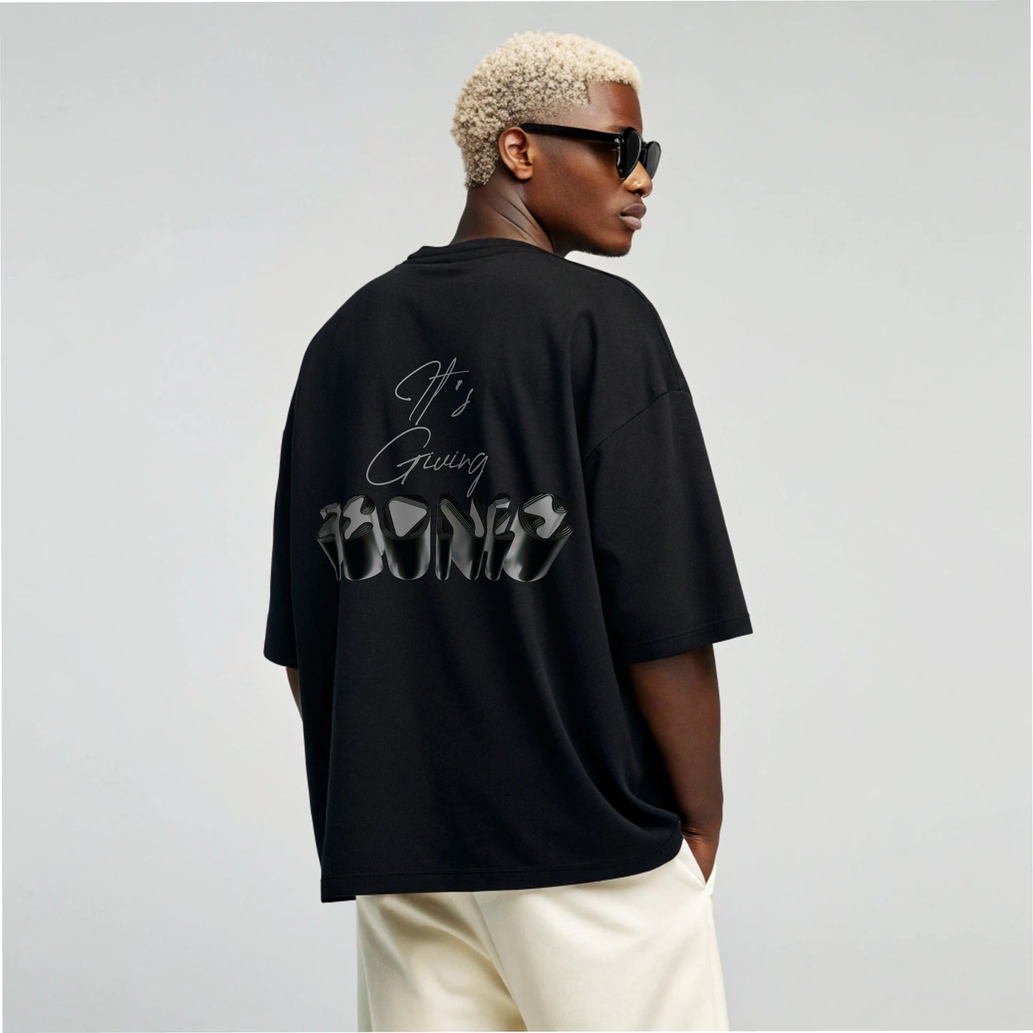 Model wearing Creating Adam the Iconic tee - black - back facing