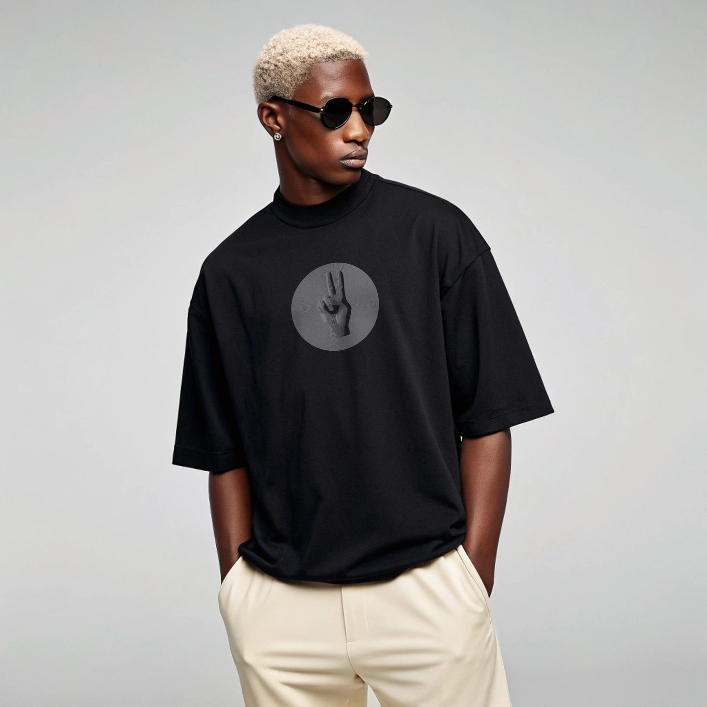 Model wearing Creating Adam the Iconic tee - black - front facing