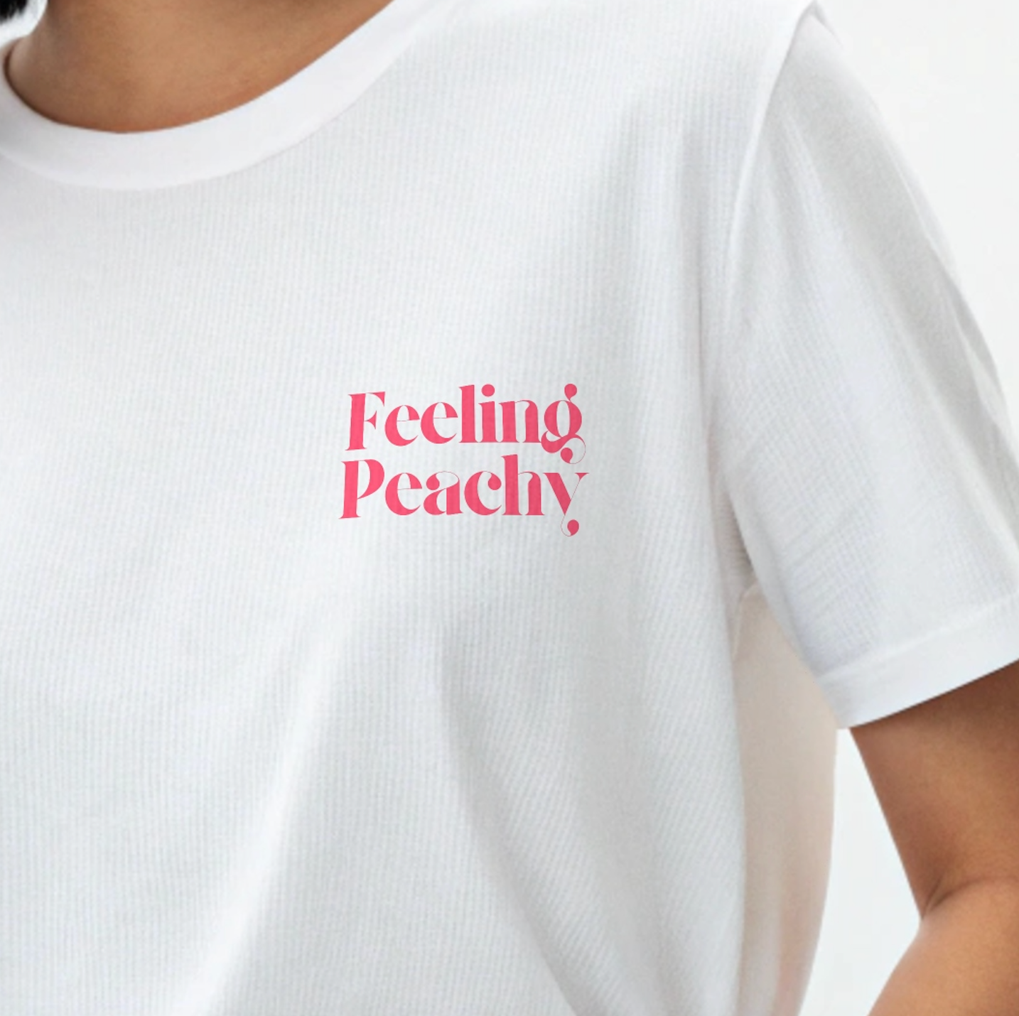 Model wearing Creating Adam's the Peach tee - front